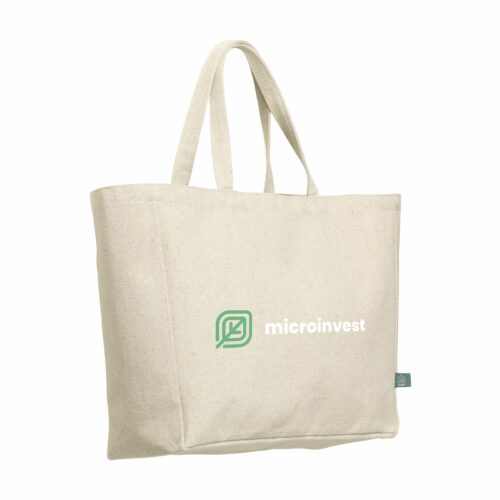Beige handlenett med Microinvest-logo.